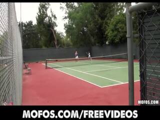 Provocative tennis MILFS are caught stretching before a match